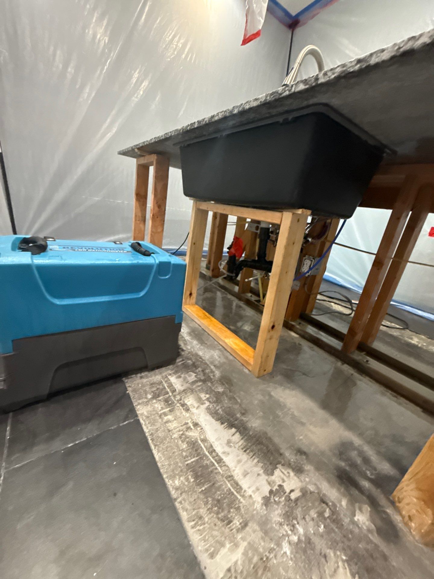 Recent kitchen water damage drying setup